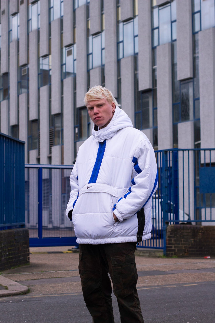 Nike quarter zip puffer pullover in white, blue and black