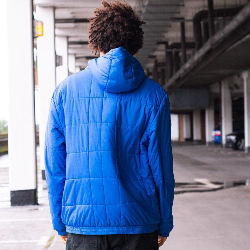 Adidas puffer jacket in blue and black