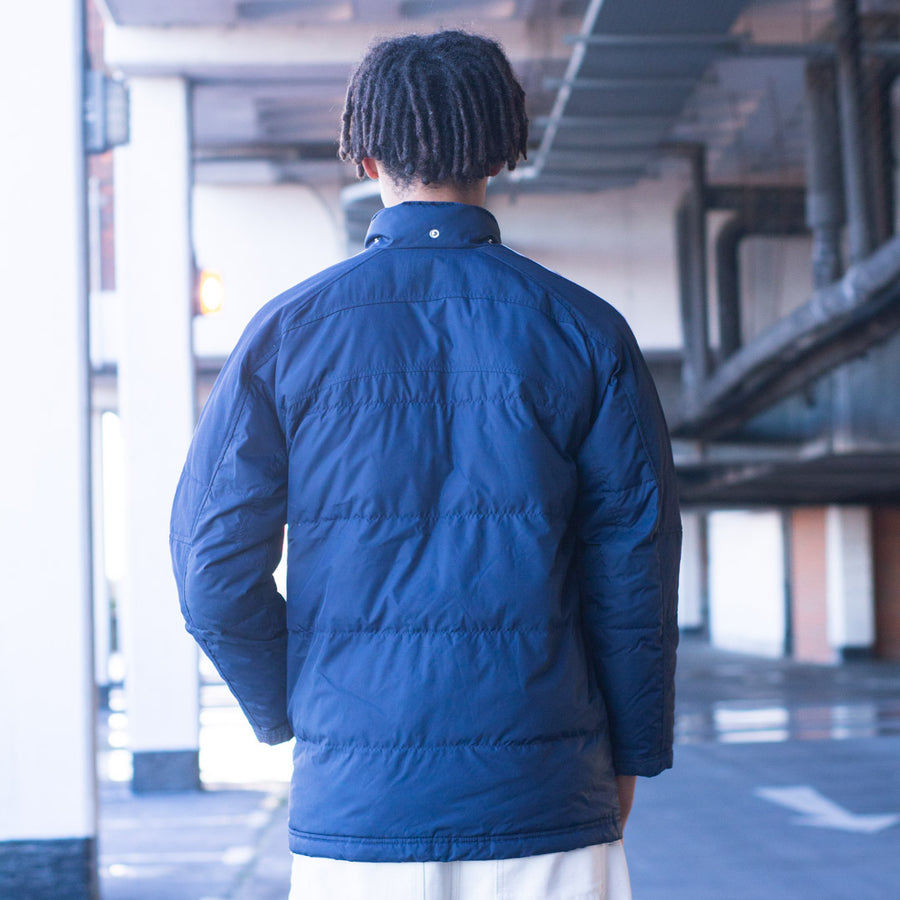 Adidas puffer jacket in navy and white
