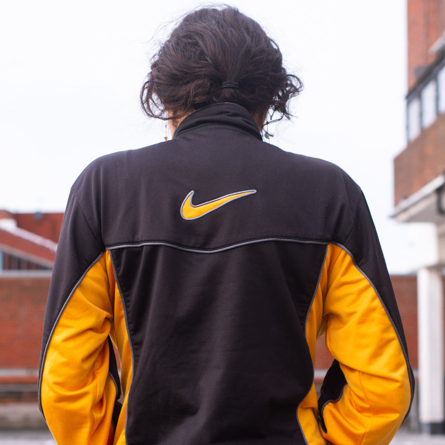 Nike zip up sweatshirt in black and orange
