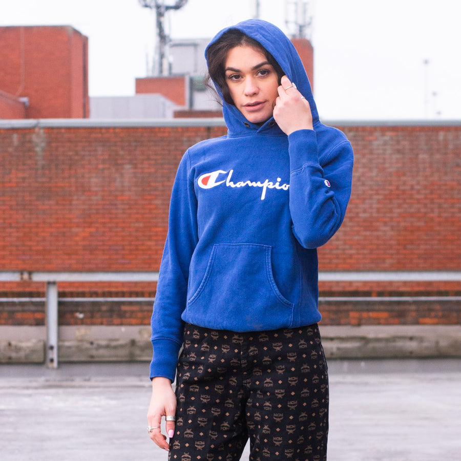 Champion spellout script hoodie in a royal blue