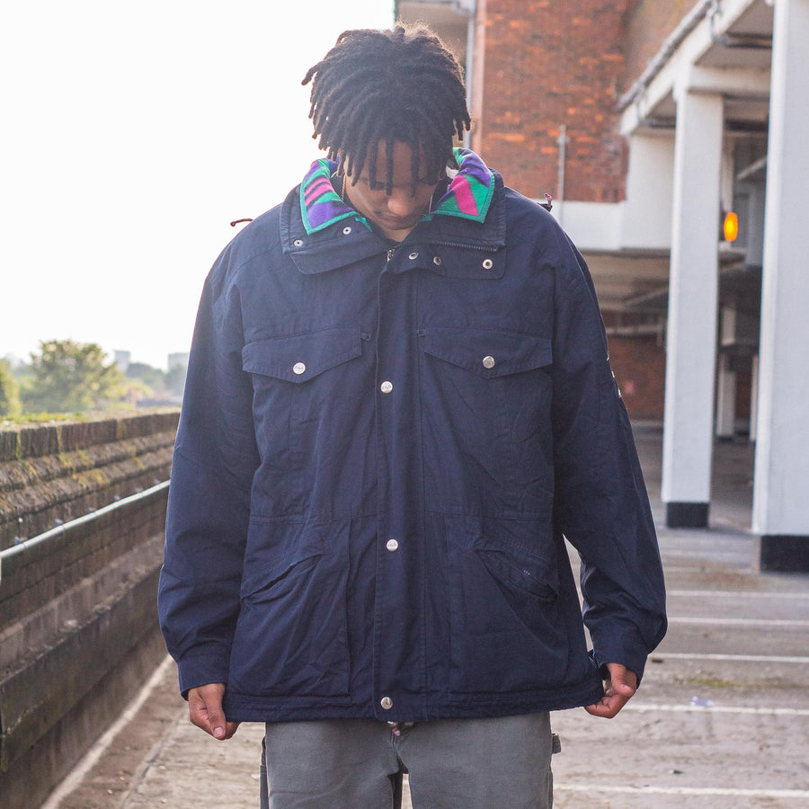 Fila Magic Line 90's Embroidered Spellout Fleece Lined 2-in-1 Parka Jacket in Navy and Teal