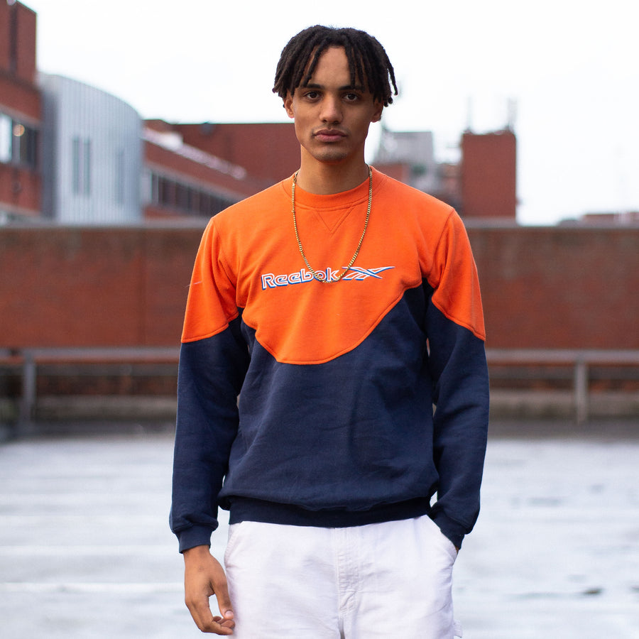 Reebok 00's Embroidered Spellout Sweatshirt in a Colourblock Orange and Navy