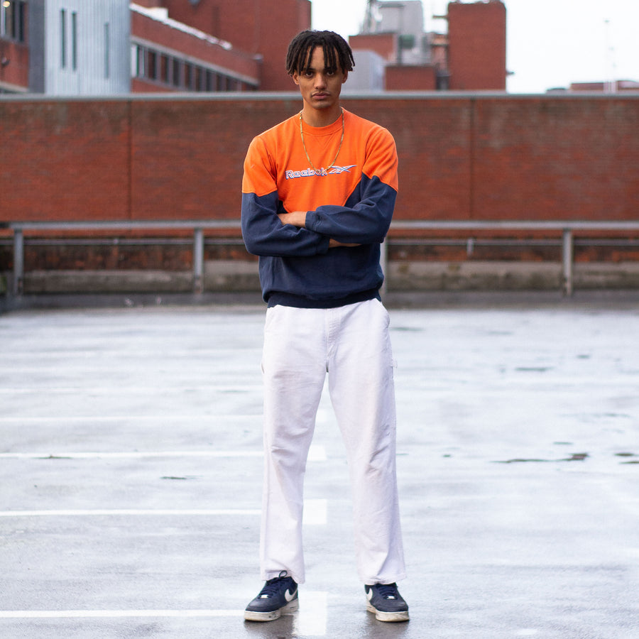 Reebok 00's Embroidered Spellout Sweatshirt in a Colourblock Orange and Navy