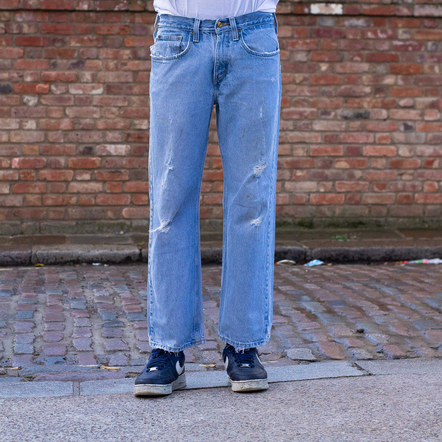 Carhartt 90's Leather Logo Straight Legged Denim Jeans in Light Blue