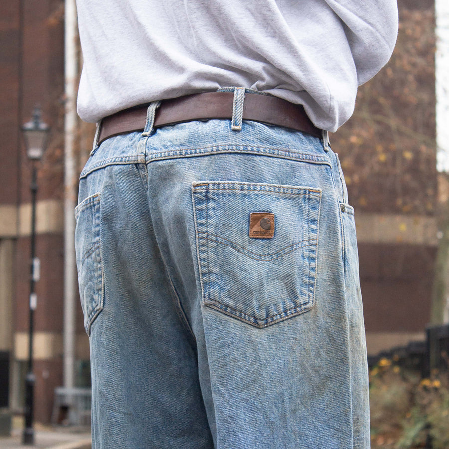 Carhartt 90's Leather Logo Straight Legged Denim Jeans in Light Blue and Brown