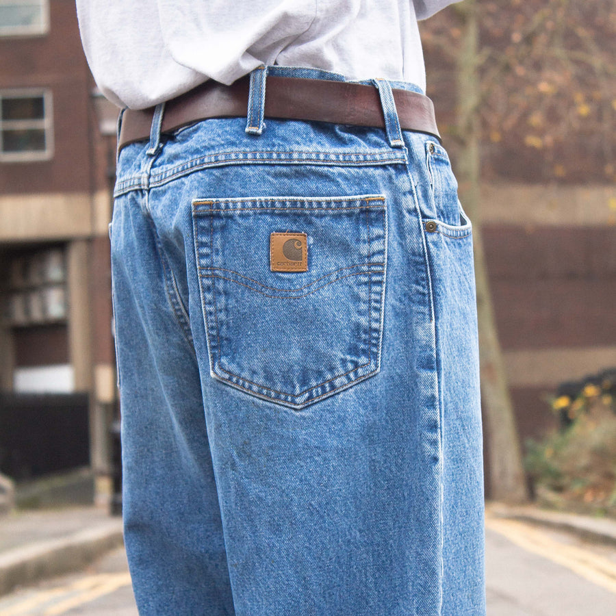 Carhartt 90's Leather Logo Straight Legged Denim Jeans in Blue and Brown