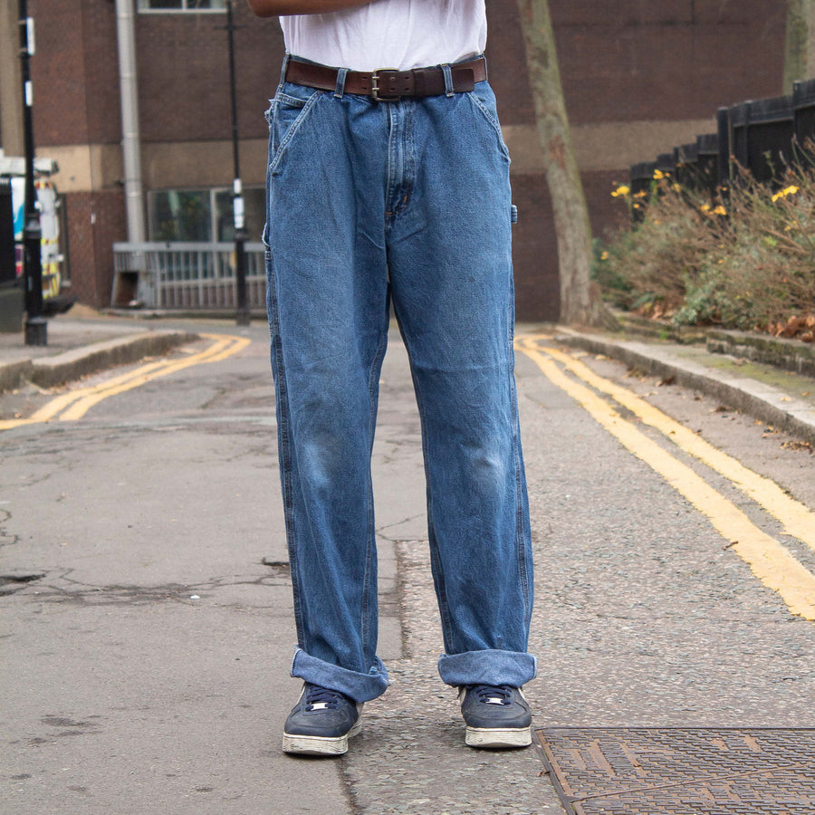 Carhartt 90's Leather Logo Straight Legged Denim Carpenter Jeans in Blue and Brown