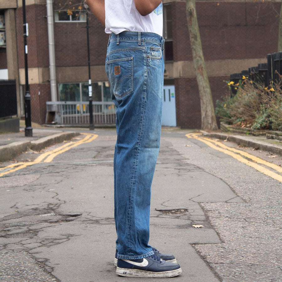 Carhartt 90's Leather Logo Straight Legged Denim Jeans in Blue and Brown