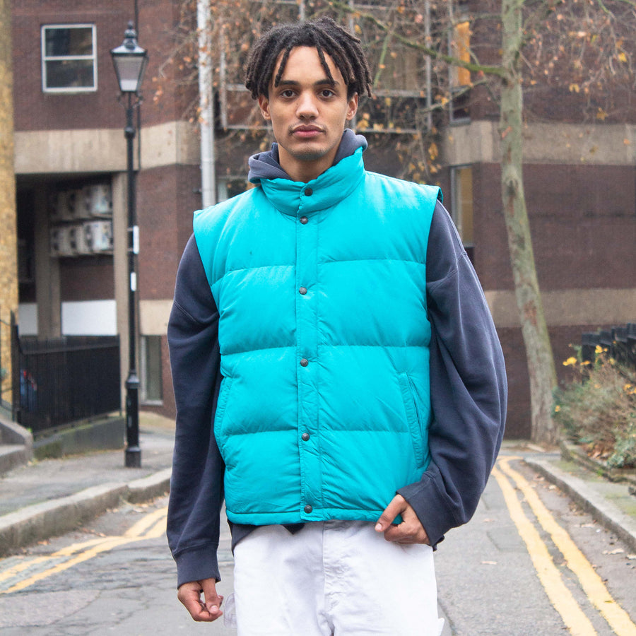The North Face Waterproof Down Puffer Gilet in Turquoise / Teal