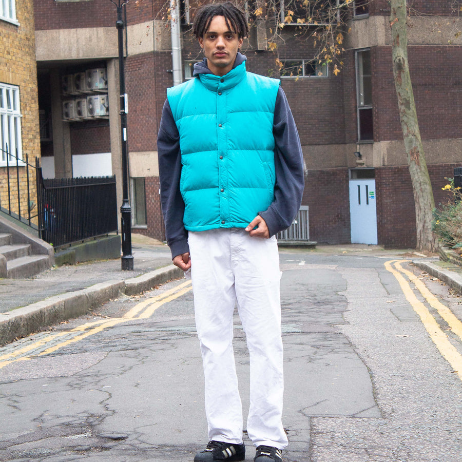 The North Face Waterproof Down Puffer Gilet in Turquoise / Teal