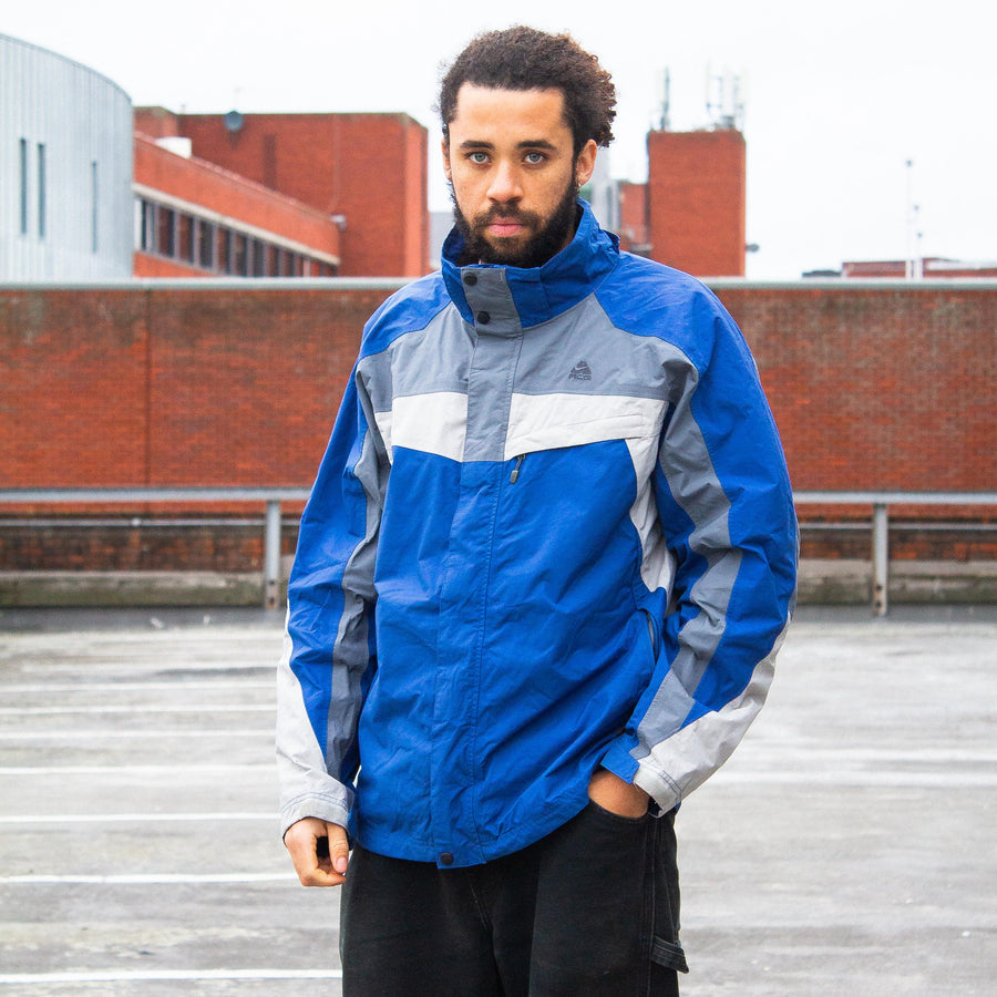 Nike ACG 00's Embroidered Logo Waterproof StormFit Jacket in Blue and Two Tone Grey