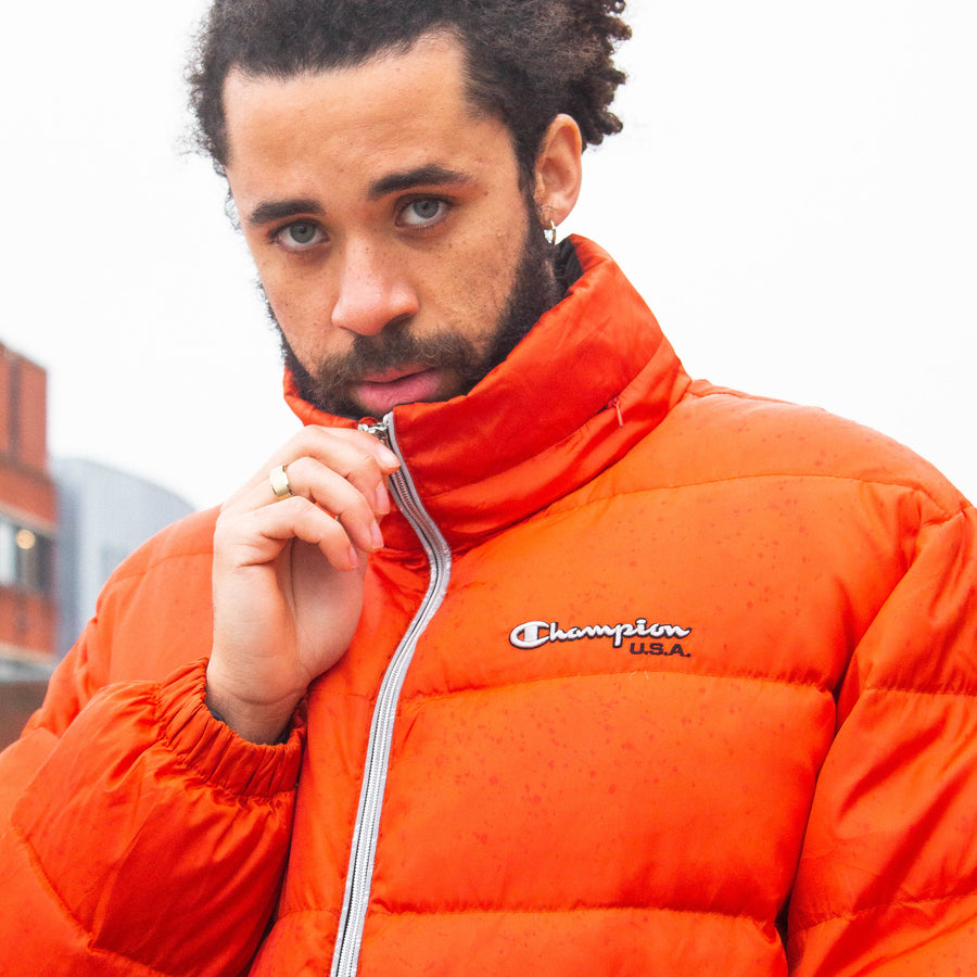 Champion 00's Embroidered Spellout Down Puffer Jacket in Orange and White