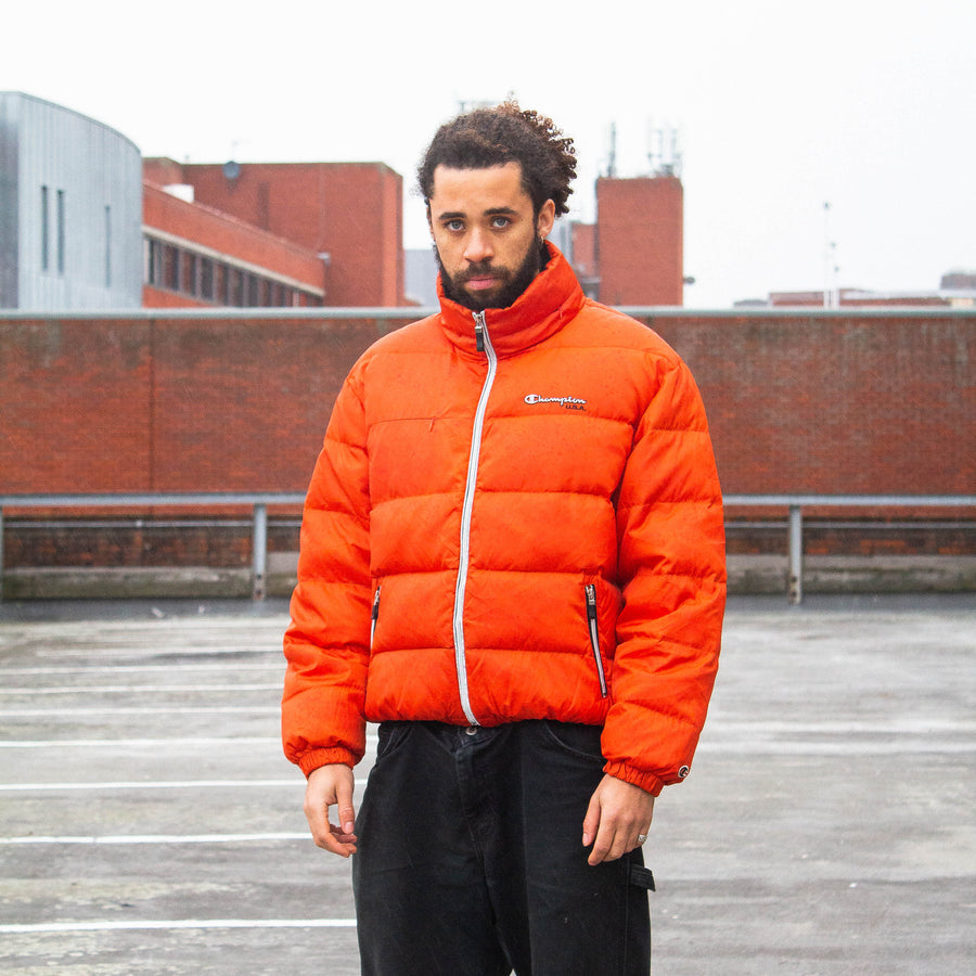 Champion 00's Embroidered Spellout Down Puffer Jacket in Orange and White